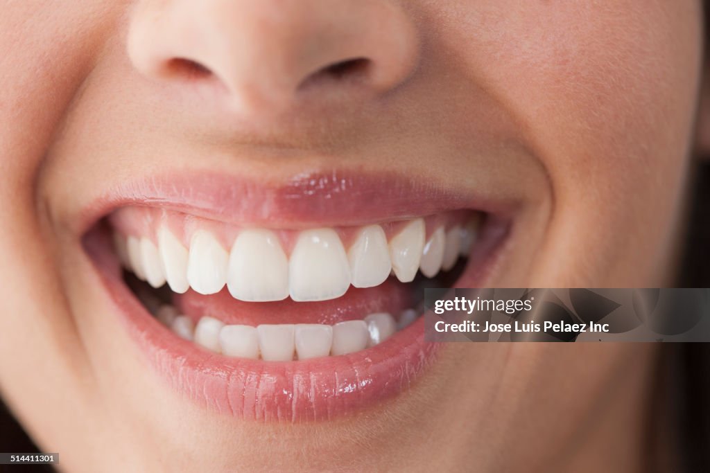 Close up of Caucasian woman's smile