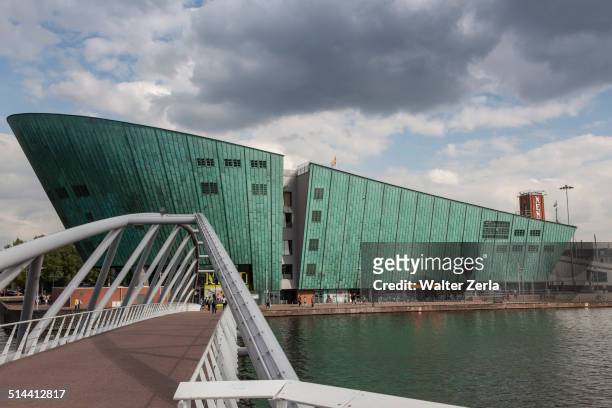science center nemo on waterfront, amsterdam, holland - nemo stock pictures, royalty-free photos & images