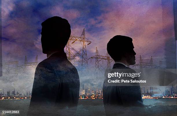 double exposure of businessmen and power lines - air cargo people stock pictures, royalty-free photos & images