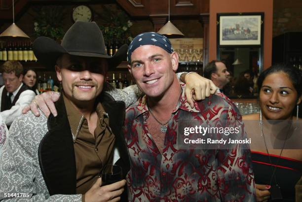 John Rich and Keith Anderson attend the after party to celebrate the premiere of Tim McGraw 's "Friday Night Lights" held at Sandy's Downtown Grill...