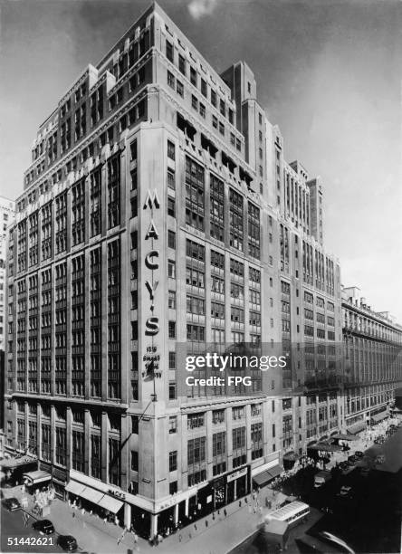Photograph shows a corner view of the 1924 addition to the Macy's department store building on 34th Street at Herald Square in Manhattan, New York,...