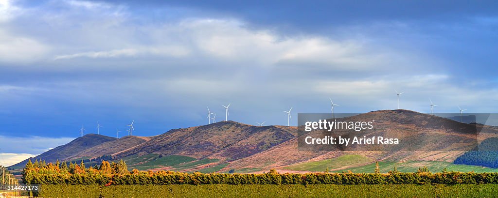 Wind Turbines Atop Rolling Hills