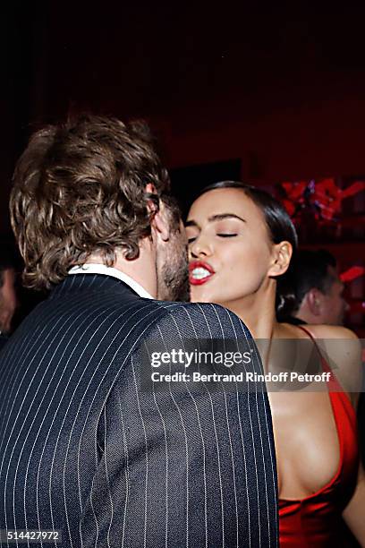 Bradley Cooper and Irina Shayk attend the L'Oreal Red Obsession Party as part of the Paris Fashion Week Womenswear Fall/Winter 2016/2017 on March 8,...