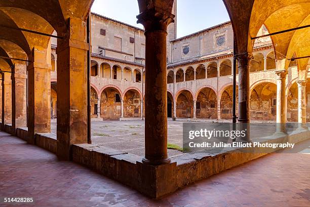 the cloisters of basilica di san martino maggiore - cloister stock pictures, royalty-free photos & images