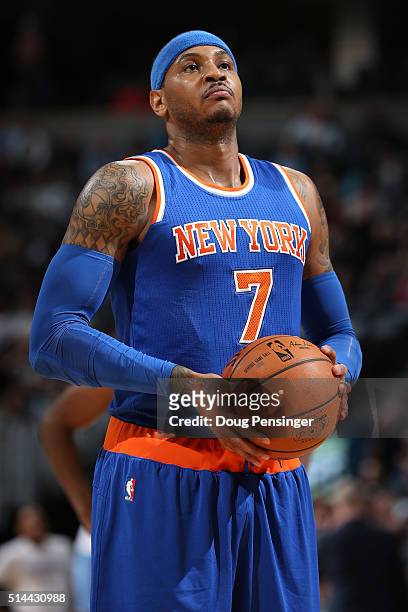 Carmelo Anthony of the New York Knicks take a free throw against the Denver Nuggets at Pepsi Center on March 8, 2016 in Denver, Colorado. The Nuggets...