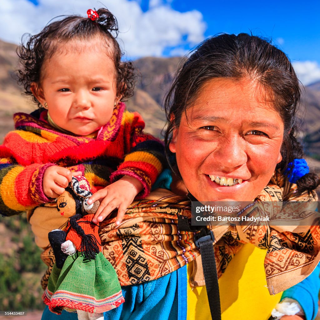 Peruviam mother carrying her baby