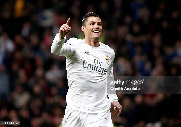 Cristiano Ronaldo of Real Madrid celebrates after scoring a goal during the UEFA Champions League Round of 16 Second Leg match between Real Madrid CF...