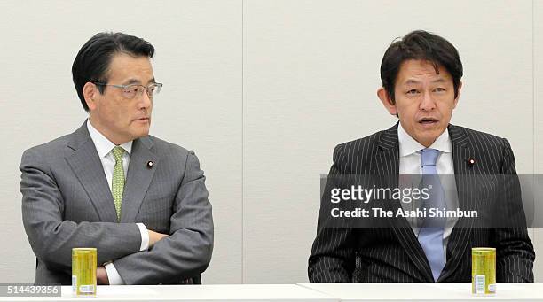 Opposition Democratic Party of Japan President Katsuya Okada and Japan Innovation Party leader Yorihisa Matsuno attend a meeting on their merger on...
