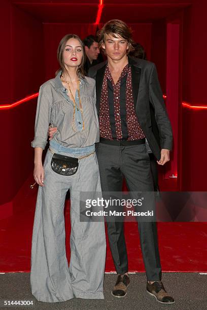 Marie-Ange Casta and Jordan Barrett attend the Red Obsession party to celebrate L'Oreal Paris's partnership with Paris Fashion Week on March 8, 2016...