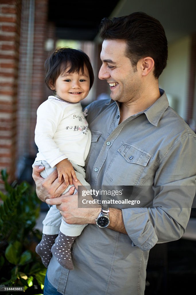 Italy, Lombardy, Milan, Father and daughter (18-23 months)