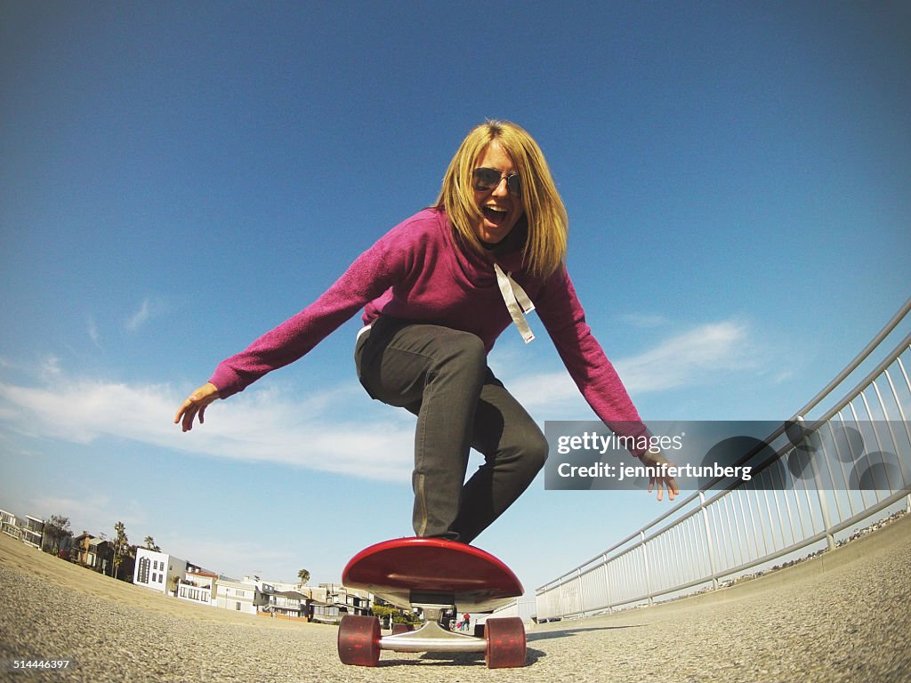 Young woman skateboarding, Los Angeles, California, America, USA