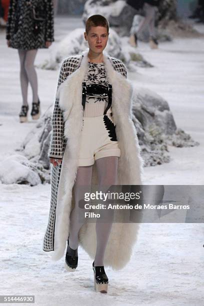 Model walks the runway during the Moncler Gamme Rouge show as part of the Paris Fashion Week Womenswear Fall/Winter 2016/2017 on March 9, 2016 in...