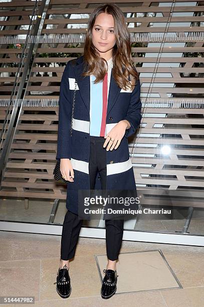 Alicia Vikander attends the Louis Vuitton show as part of the Paris Fashion Week Womenswear Fall/Winter 2016/2017 on March 9, 2016 in Paris, France.