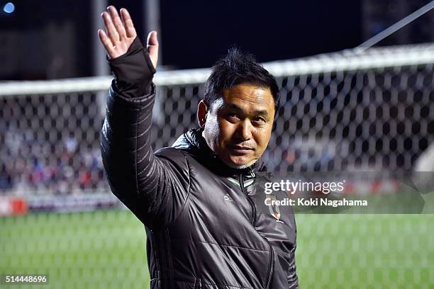 Norio Sasaki head coach of Japan applauds supporters after the AFC Women's Olympic Final Qualification Round match between Japan and North Korea at...