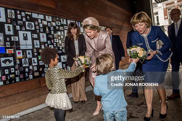 Queen Mathilde of Belgium and Daniela Schadt, partner of German President Joachim Gauck arrives for a visit to the MoMu fashion museum in Antwerp, as...