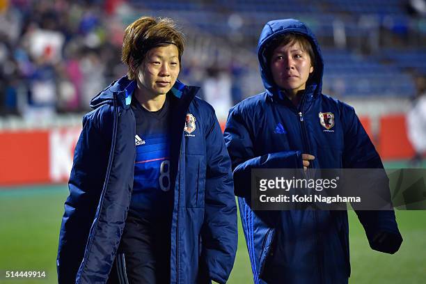 Aya Miyama of Japan applauds supporters while Mana Iwabuchi sheds tears after the AFC Women's Olympic Final Qualification Round match between Japan...