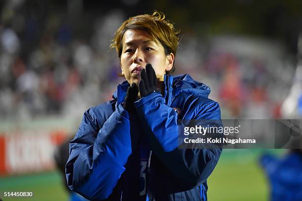 Azusa Iwashimizu of Japan applauds the supporters after the AFC Women's Olympic Final Qualification Round match between Japan and North Korea at...
