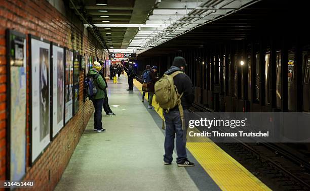 New York, United States of America Passengers waiting on a platform of the New York subway on a train on February 26, 2016 in New York, United States...