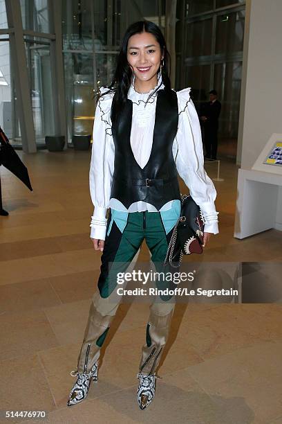 Liu Wen attends the Louis Vuitton show as part of the Paris Fashion Week Womenswear Fall/Winter 2016/2017. Held at Louis Vuitton Foundation on March...