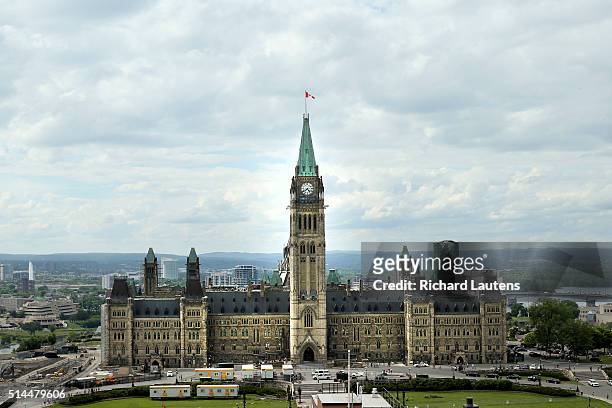 Ottawa, Canada - June 15 - Centre block and the peace tower on Parliament Hill. Stock photography of buildings and institutions in Ottawa for future...