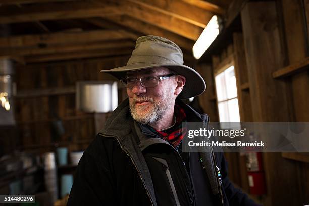 March 4 - Jim Aikenhead, program instructor, demonstrates how maple sap is turned into maple syrup through an evaporator at the Mountsberg...