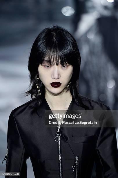 Model walks the runway during the Louis Vuitton show as part of the Paris Fashion Week Womenswear Fall/Winter 2016/2017 on March 9, 2016 in Paris,...