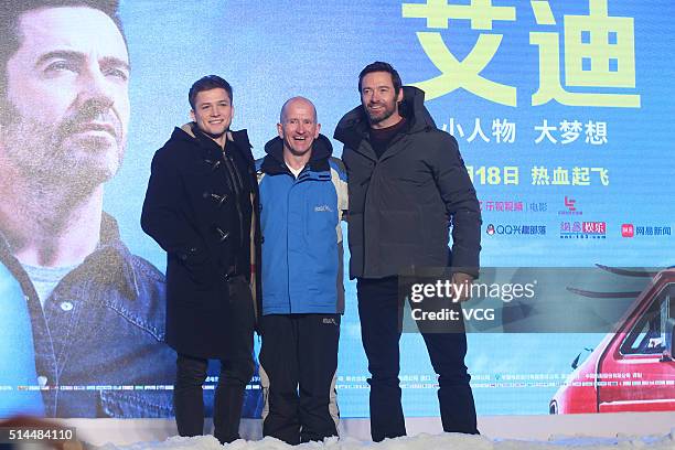 Welsh actor Taron Egerton, British skier Michael Edwards, better known as Eddie "The Eagle" Edwards, and Australia actor Hugh Jackman attend a press...