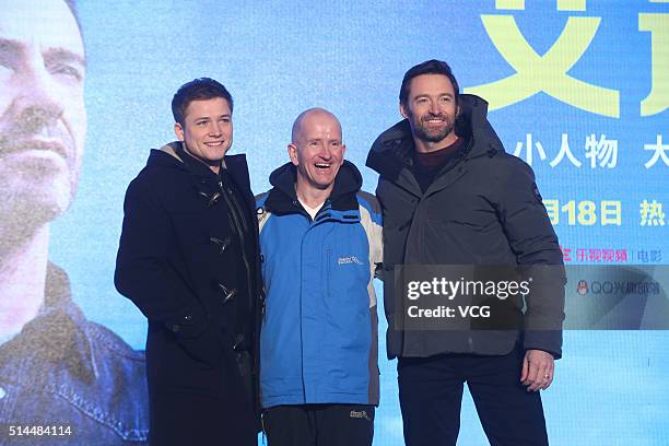 Welsh actor Taron Egerton, British skier Michael Edwards, better known as Eddie "The Eagle" Edwards, and Australia actor Hugh Jackman attend a press...