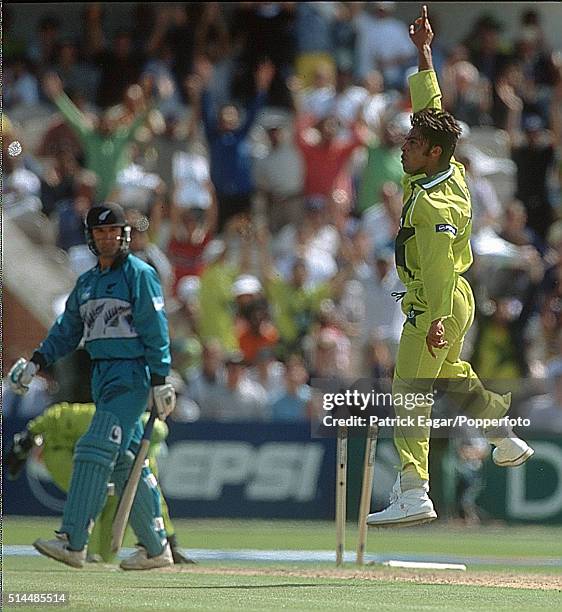 Nathan Astle of New Zealand is bowled by Shoaib Akhtar of Pakistan for 3 during the ICC World Cup Semi Final between New Zealand and Pakistan at Old...