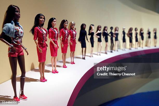 Barbie dolls are displayed during the exhibition "Barbie, life of an icon" at the Museum of Decorative Arts as part of the Paris Fashion Week...