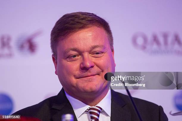 Frederic Gossot, country manager for Germany and Austria at Qatar Airways Ltd., reacts during a news conference at the ITB travel trade show in...