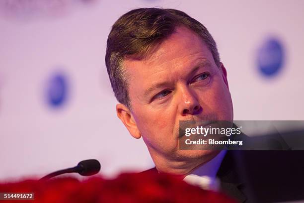 Jonathan Harding, vice president of Europe at Qatar Airways Ltd., left, looks on during a news conference at the ITB travel trade show in Berlin,...