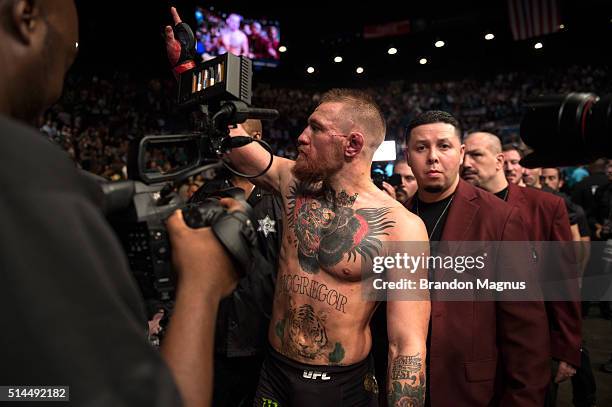 Conor McGregor exits the Octagon after his submission loss to Nate Diaz in their welterweight bout during the UFC 196 in the MGM Grand Garden Arena...