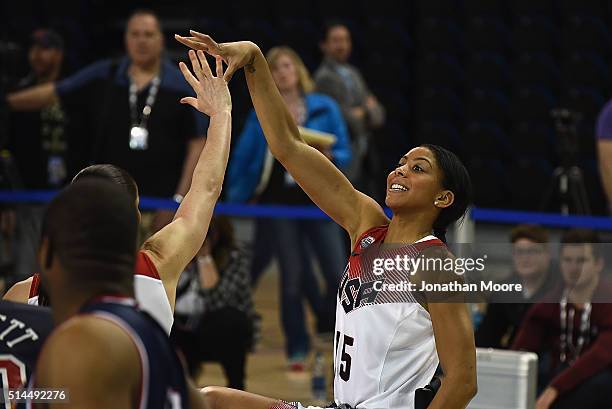 Candice Parker participates in a wheelchair basketball demonstration during the 2016 Team USA Media Summit at UCLA's Pauley Pavilion on March 8, 2016...