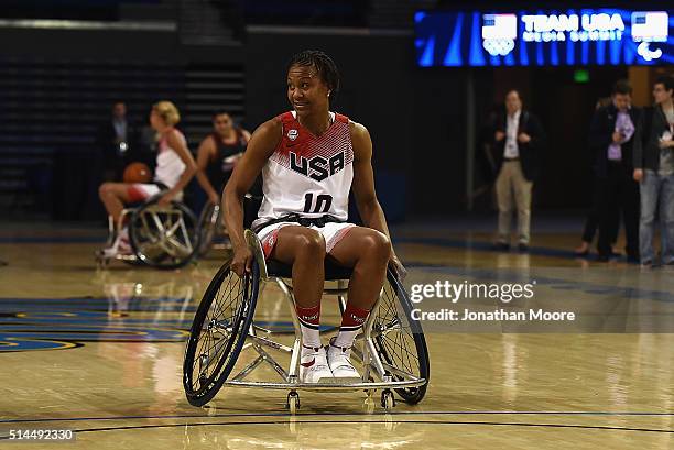Tamika Catchings participates in a wheelchair basketball demonstration during the 2016 Team USA Media Summit at UCLA's Pauley Pavilion on March 8,...