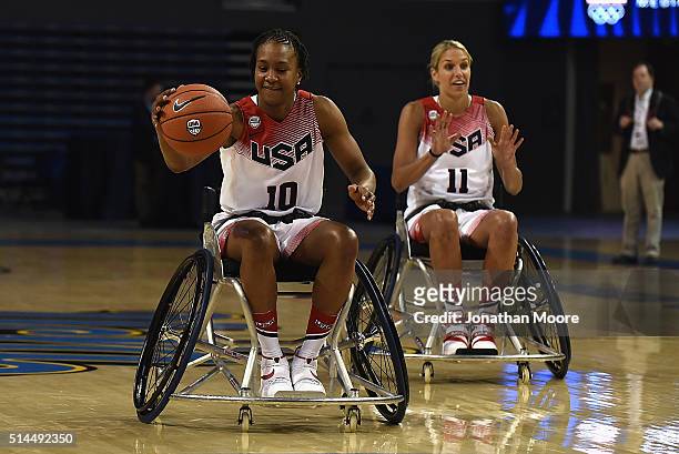 Tamika Catchings and Elena Delle Donne participate in a wheelchair basketball demonstration during the 2016 Team USA Media Summit at UCLA's Pauley...
