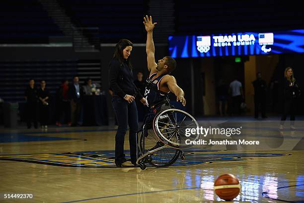 Paralympic medalist Trevon Jenifer demonstrates wheelchair basketball during the 2016 Team USA Media Summit at UCLA's Pauley Pavilion on March 8,...