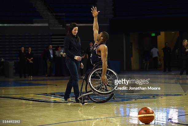 Paralympic medalist Trevon Jenifer demonstrates wheelchair basketball during the 2016 Team USA Media Summit at UCLA's Pauley Pavilion on March 8,...