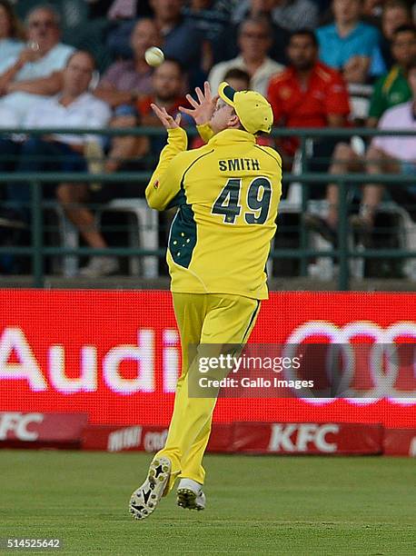 Steven Smith of Australia takes a catch to dismiss Rilee Rossouw of South Africa during the 3rd KFC T20 International match between South Africa and...