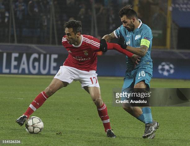 Danny of FC Zenit in action against Jonas Goncalves of Benfica during the UEFA Champions League round 16 second-leg football match between FC Zenit...