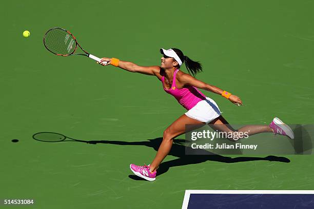 Heather Watson of Great Britain stretches for a forehand in her match against Galina Voskoboeva of Kazakhstan during day three of the BNP Paribas...