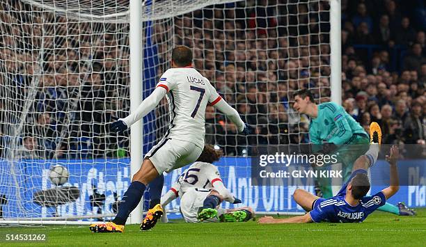 Paris Saint-Germain's French midfielder Adrien Rabiot scores the opening goal during the UEFA Champions League round of 16 second leg football match...
