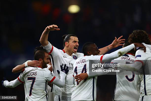 Zlatan Ibrahimovic of PSG celebrates after providing the cross for the opening goal scored by teammate Adrien Rabiot of PSG during the UEFA Champions...