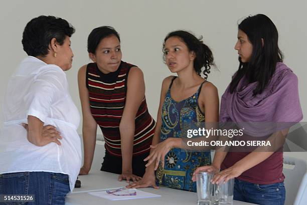 Daughters of murdered indigenous activist Berta Caceres, Olivia Marcela , Berta Isabel and Laura Zuniga Caceres , are seen before a press conference...