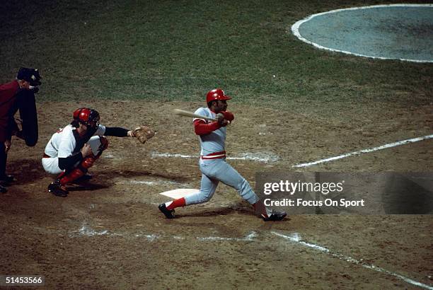 Second baseman Joe Morgan of the Cincinnati Reds makes a big cut during the World Series against the Boston Red Sox at Fenway Park on October 1975 in...