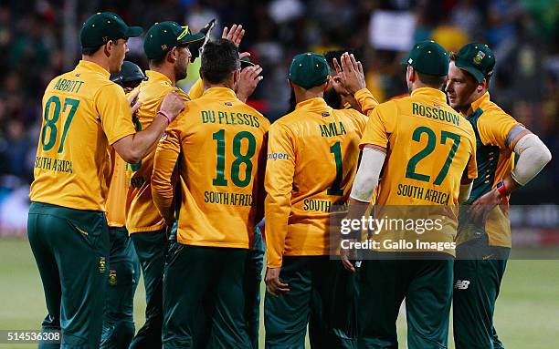 Faf du Plessis of South Africa celebrates after taking a catch to dismiss Shane Watson of Australia during the 3rd KFC T20 International match...