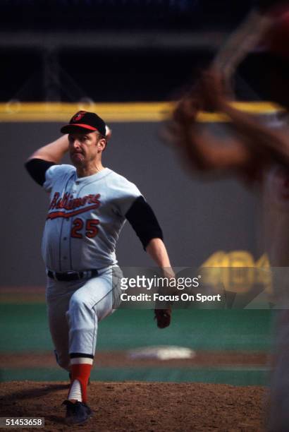 Moe Drabowsky of the Baltimore Orioles pitches during Game Two of the World Series against the Cincinnati Reds at Riverfront Stadium on October 11,...