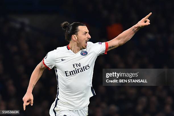 Paris Saint-Germain's Swedish forward Zlatan Ibrahimovic celebrates scoring his team's second goal during the UEFA Champions League round of 16...