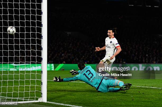 Zlatan Ibrahimovic of PSG scores his team's second goal past goalkeeper Thibaut Courtois of Chelsea during the UEFA Champions League round of 16,...