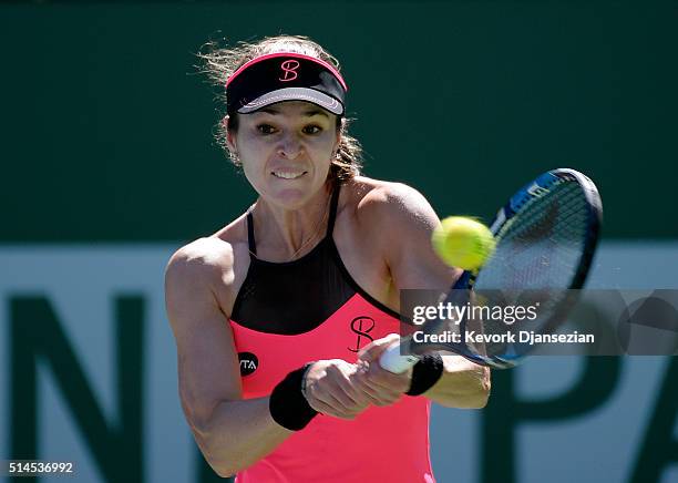 Galina Voskoboeva of Kazakhstan hits a backhand against Heather Watson of Great Britain during day three of the BNP Paribas Open at Indian Wells...